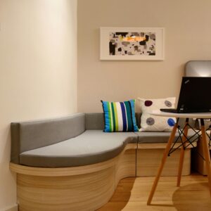 Comfortable hotel room with modern design and minimalistic decor.